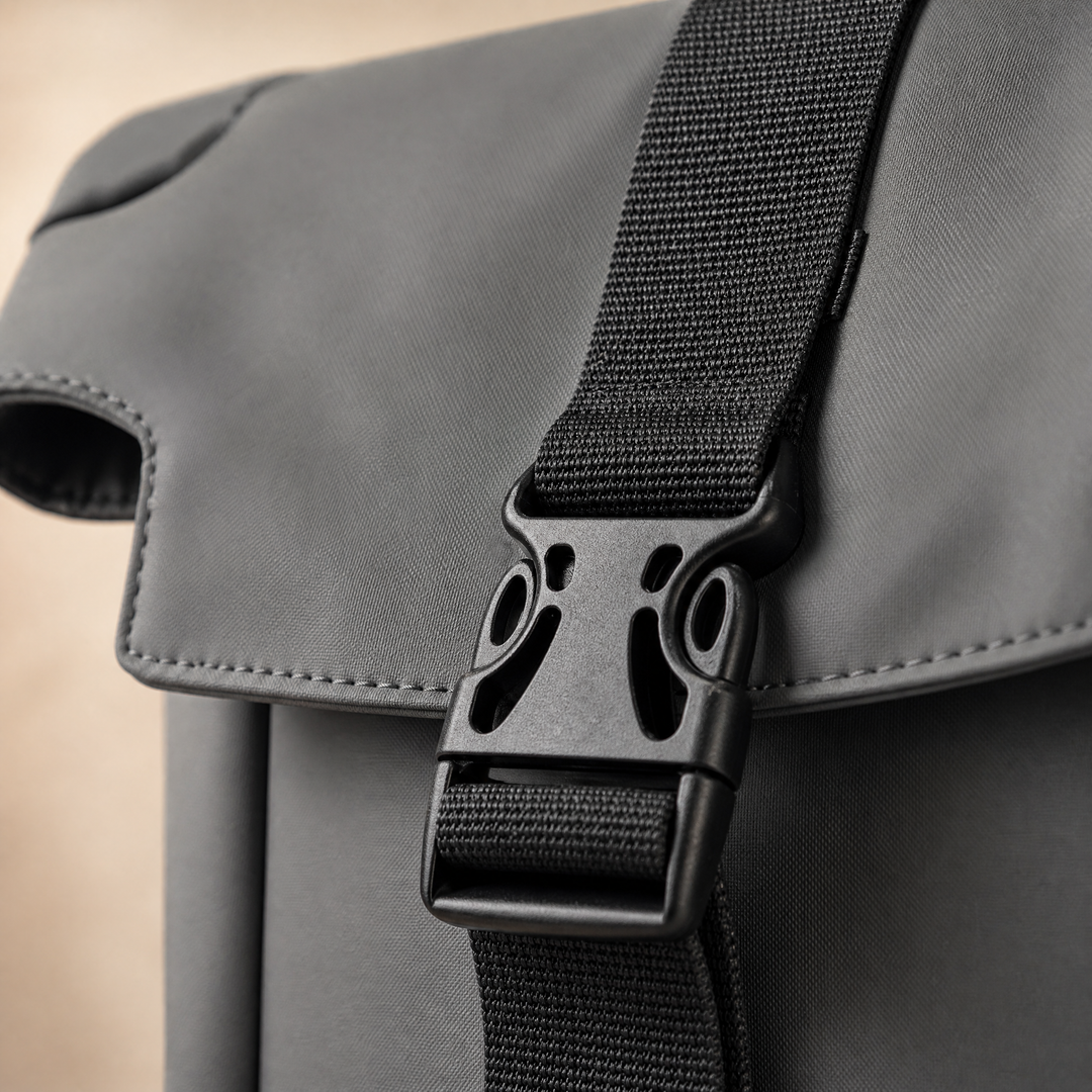 Side-release buckle and webbing strap detail on the FURL Sling