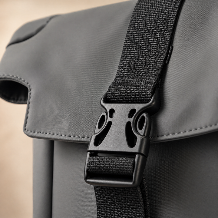 Side-release buckle and webbing strap detail on the FURL Sling