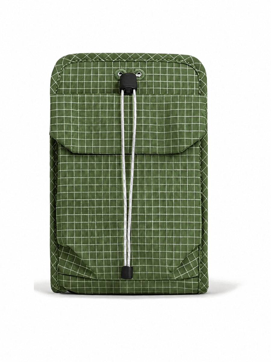 Organizer crossbody bag in Pine Green, front view with the shock-cord flap pocket