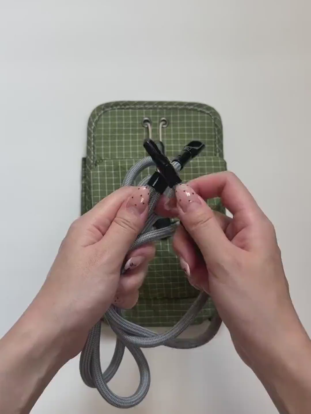 Organizer crossbody bag: the full packing demo — opens flat, loads up with a phone, e-reader, cards, coins and keys, then cinches shut